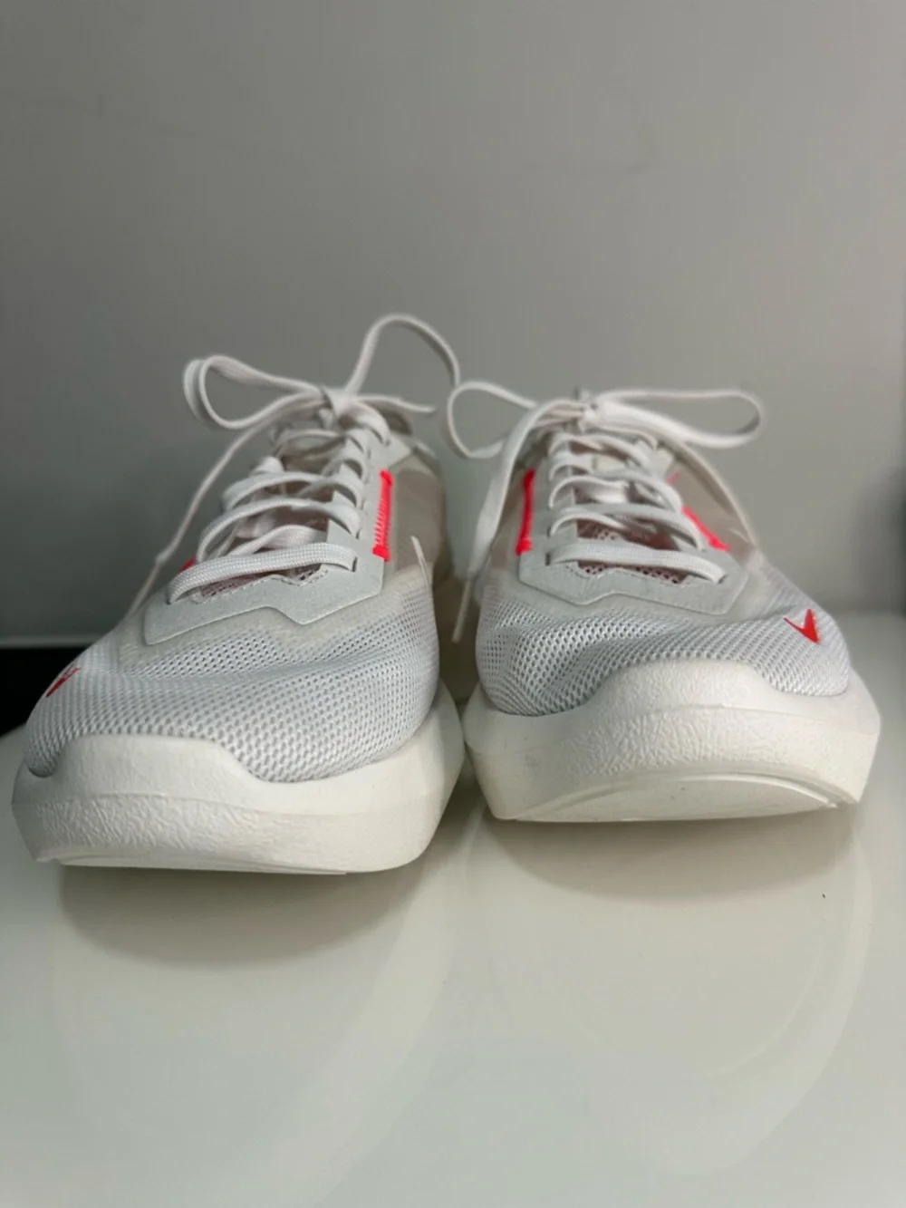 Nike Women’s White Mesh Sneakers with Coral Accents - Picture 2 of 8